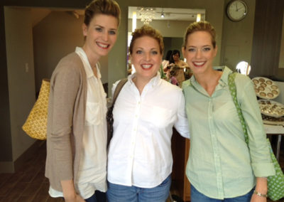 Three Women Showing Off Their New Styles